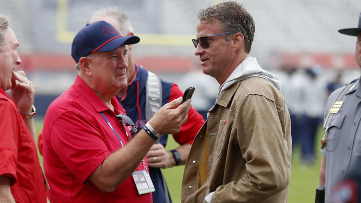 Nov 8, 2025; Oxford, Mississippi, USA; Mississippi Rebels head coach Lane Kiffin speaks to a reporter prior to the game against The Citadel Bulldogs at Vaught-Hemingway Stadium. Mandatory Credit: Petre Thomas-Imagn Images Nov 8, 2025; Oxford, Mississippi, USA; Mississippi Rebels head coach Lane Kiffin speaks to a reporter prior to the game against The Citadel Bulldogs at Vaught-Hemingway Stadium. Mandatory Credit: Petre Thomas-Imagn Images