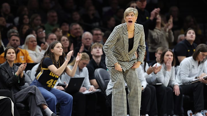 Dec 20, 2025; Brooklyn, New York, USA; Iowa Hawkeyes head coach Jan Jensen yells during the first half against the UConn Huskies at Barclays Center. Mandatory Credit: Pamela Smith-Imagn Images