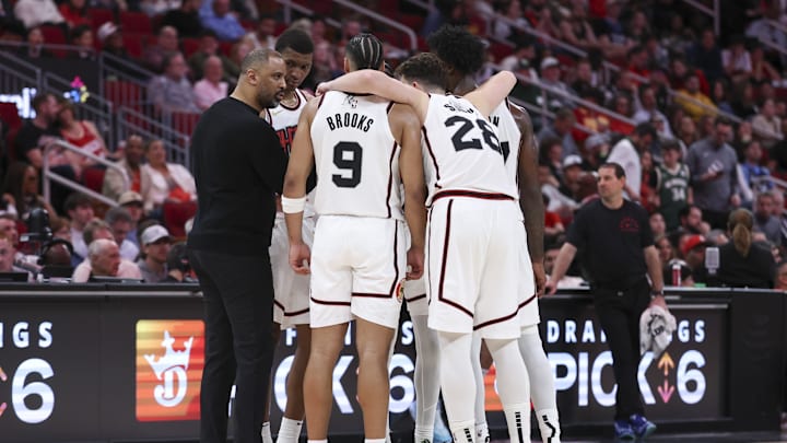 Feb 25, 2025; Houston, Texas, USA; Houston Rockets head coach Ime Udoka talks with players during the fourth quarter against the Milwaukee Bucks at Toyota Center. Mandatory Credit: Troy Taormina-Imagn Images