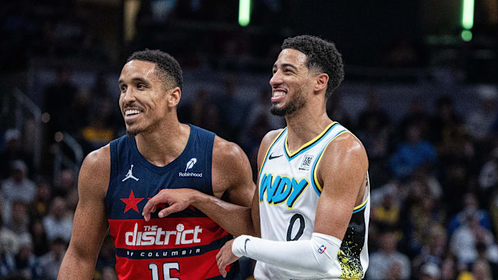 Nov 24, 2024; Indianapolis, Indiana, USA; Washington Wizards guard Malcolm Brogdon (15) and Indiana Pacers guard Tyrese Haliburton (0) in the second half at Gainbridge Fieldhouse. Mandatory Credit: Trevor Ruszkowski-Imagn Images