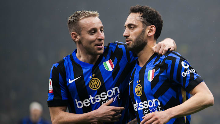 Hakan Calhanoglu (R) of FC Internazionale celebrates with...