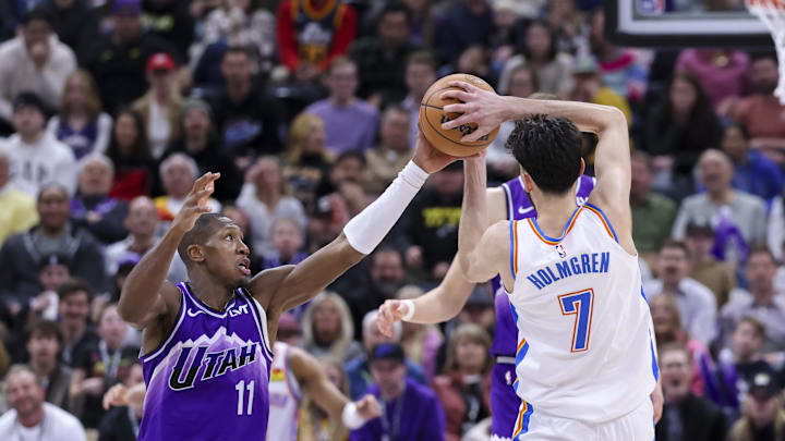 Feb 6, 2024; Salt Lake City, Utah, USA; Utah Jazz guard Kris Dunn (11) knocks the ball away from