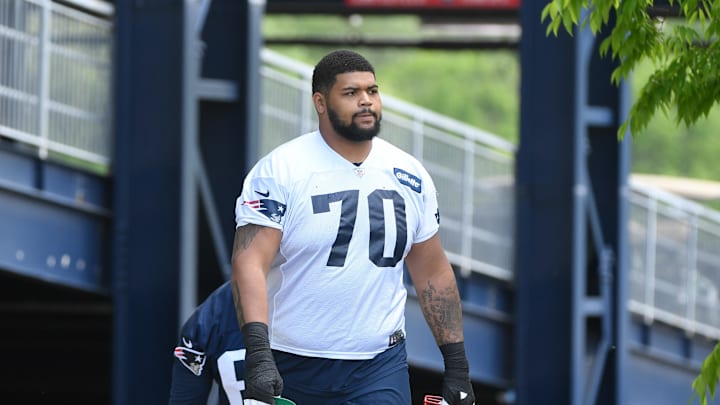 May 23, 2022; Foxborough, MA, USA; New England Patriots offensive tackle Yasir Durant (70) walks to the practice field for the team's OTA at Gillette Stadium. Mandatory Credit: Eric Canha-Imagn Images