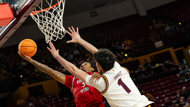 Arizona State Sun Devils Santiago Trouet (1) jumps to block a shot from Southern Utah Thunderbirds Zach Bell (5) during a game at Desert Financial Arena in Tempe on Nov. 4, 2025.