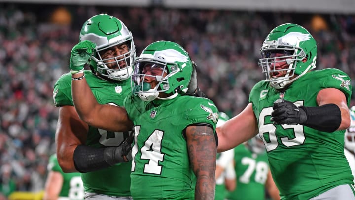 Oct 22, 2023; Philadelphia, Pennsylvania, USA; Philadelphia Eagles running back Kenneth Gainwell (14) celebrates his touchdown with offensive tackle Jordan Mailata (68) and offensive tackle Lane Johnson (65) against the Miami Dolphins at Lincoln Financial Field. Oct 22, 2023; Philadelphia, Pennsylvania, USA; Philadelphia Eagles running back Kenneth Gainwell (14) celebrates his touchdown with offensive tackle Jordan Mailata (68) and offensive tackle Lane Johnson (65) against the Miami Dolphins at Lincoln Financial Field.