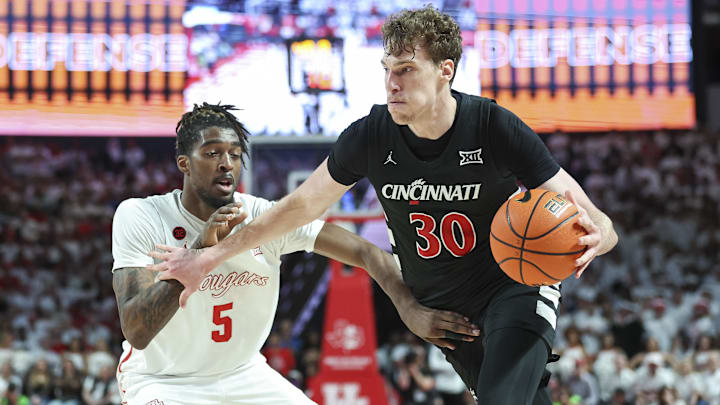 Feb 27, 2024; Houston, Texas, USA; Cincinnati Bearcats forward Viktor Lakhin (30) dribbles the ball Feb 27, 2024; Houston, Texas, USA; Cincinnati Bearcats forward Viktor Lakhin (30) dribbles the ball