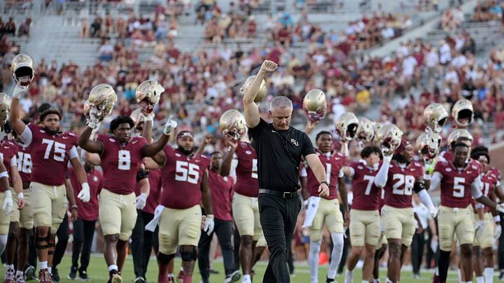 Sep 7, 2026; Tallahassee, Florida, USA;  Florida State Seminoles head coach Mike Norvell enters the field before the game against the Southern Methodist Mustangs at Doak S. Campbell Stadium.  Mandatory Credit: Melina Myers-Imagn Images