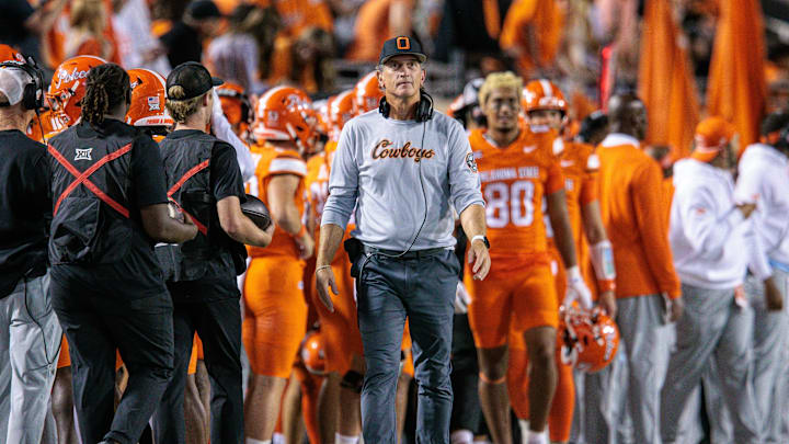Oct 18, 2025; Stillwater, Oklahoma, USA; Oklahoma State Cowboys interim head coach Doug Meacham on the side lines during the second half against the Cincinnati Bearcats at Boone Pickens Stadium. Mandatory Credit: William Purnell-Imagn Images
