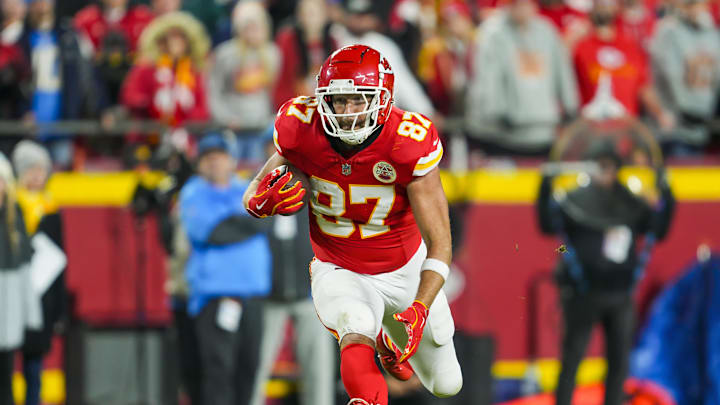 Dec 8, 2024; Kansas City, Missouri, USA; Kansas City Chiefs tight end Travis Kelce (87) runs with the ball during the second half against the Los Angeles Chargers at GEHA Field at Arrowhead Stadium. Mandatory Credit: Jay Biggerstaff-Imagn Images Dec 8, 2024; Kansas City, Missouri, USA; Kansas City Chiefs tight end Travis Kelce (87) runs with the ball during the second half against the Los Angeles Chargers at GEHA Field at Arrowhead Stadium. Mandatory Credit: Jay Biggerstaff-Imagn Images