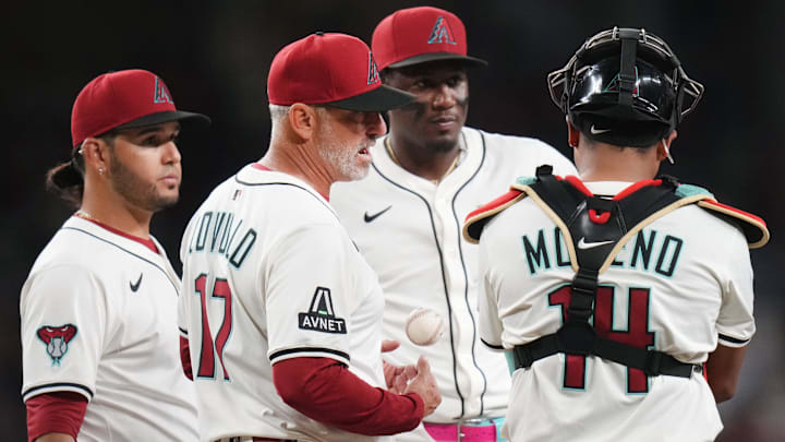 Arizona Diamondbacks head coach Torey Lovullo walks out to the mound to talk to his team during their Opening Day game against the Chicago Cubs at Chase Field in Phoenix on March 27, 2025.