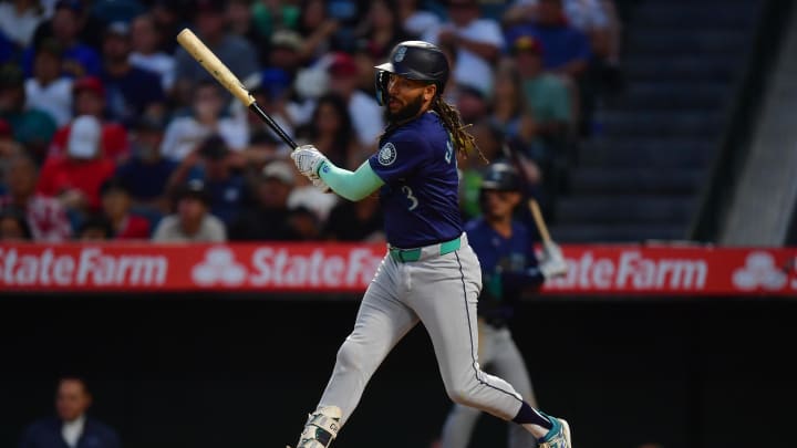 Seattle Mariners shortstop J.P. Crawford (3) hits an RBI single against the Los Angeles Angels during the sixth inning at Angel Stadium on July 11.
