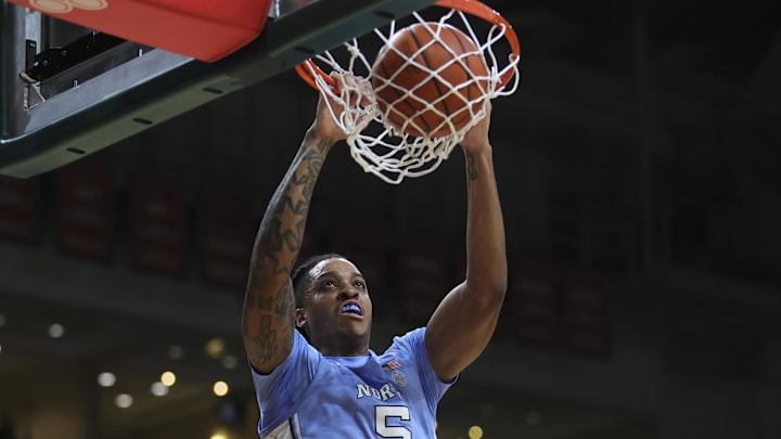 Feb 10, 2024; Coral Gables, Florida, USA; North Carolina Tar Heels forward Armando Bacot (5) dunks