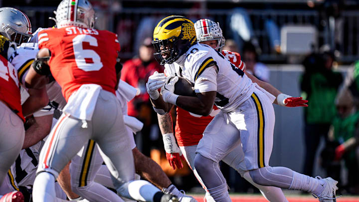 Michigan running back Kalel Mullings runs against Ohio State during the second half at Ohio Stadium. Michigan running back Kalel Mullings runs against Ohio State during the second half at Ohio Stadium.