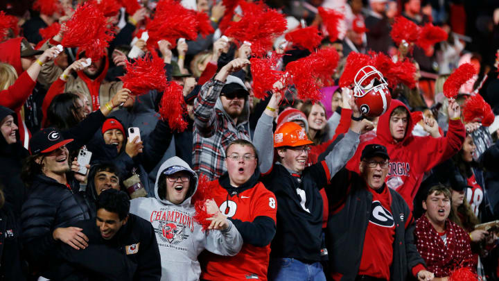 Georgia fans celebrate late during the second half of a NCAA college football game against Ole Miss in Athens, Ga., on Saturday, Nov. 11, 2023. Georgia won 52-17. Georgia fans celebrate late during the second half of a NCAA college football game against Ole Miss in Athens, Ga., on Saturday, Nov. 11, 2023. Georgia won 52-17.