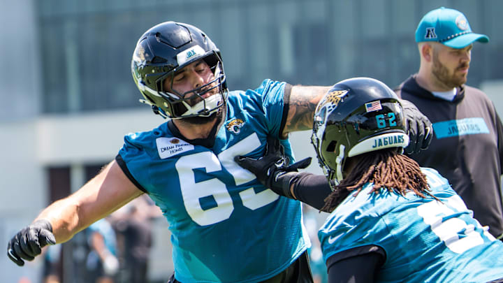 Jacksonville Jaguars guard Patrick Mekari (65) and Jacksonville Jaguars offensive tackle Javon Foster (62) run blocking drills during the fourth organized team activity at the Miller Electric Center in Jacksonville, Fla. Tuesday, May 27, 2025. [Doug Engle/Florida Times-Union]