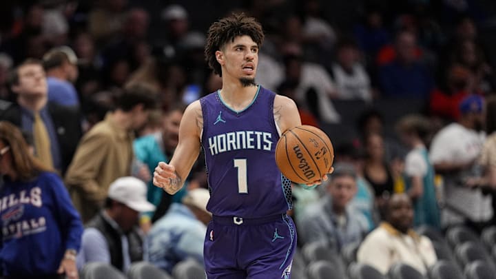 Mar 20, 2025; Charlotte, North Carolina, USA; Charlotte Hornets guard LaMelo Ball (1) brings the ball up court against the New York Knicks during the second half at Spectrum Center. Mandatory Credit: Jim Dedmon-Imagn Images Mar 20, 2025; Charlotte, North Carolina, USA; Charlotte Hornets guard LaMelo Ball (1) brings the ball up court against the New York Knicks during the second half at Spectrum Center. Mandatory Credit: Jim Dedmon-Imagn Images