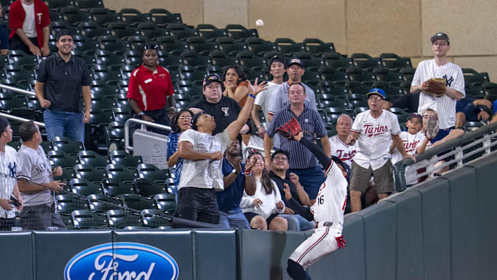 Sep 15, 2025; Minneapolis, Minnesota, USA; Minnesota Twins left fielder Austin Martin (16) catches a fly ball against the New York Yankees in the eighth inning at Target Field. Sep 15, 2025; Minneapolis, Minnesota, USA; Minnesota Twins left fielder Austin Martin (16) catches a fly ball against the New York Yankees in the eighth inning at Target Field.