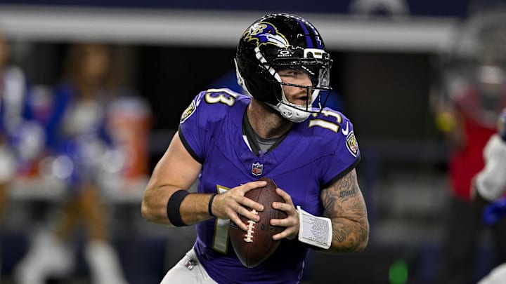 Aug 16, 2025; Arlington, Texas, USA; Baltimore Ravens quarterback Devin Leary (13) rolls out with the ball during the second half against the Dallas Cowboys at AT&T Stadium. Mandatory Credit: Jerome Miron-Imagn Images