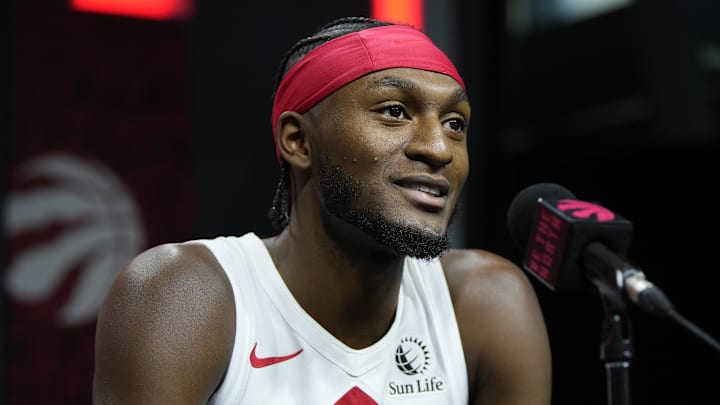 Sep 30, 2024; Toronto, Ontario, Canada; Toronto Raptors guard Immanuel Quickley (5) talks to the media during media day at Scotiabank Area. Mandatory Credit: John E. Sokolowski-Imagn Images
