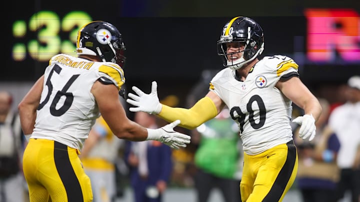 Sep 8, 2024; Atlanta, Georgia, USA; Pittsburgh Steelers linebacker T.J. Watt (90) celebrates with linebacker Alex Highsmith (56) after a sack against the Atlanta Falcons in the fourth quarter at Mercedes-Benz Stadium. Mandatory Credit: Brett Davis-Imagn Images