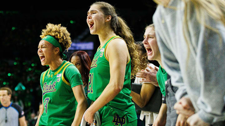 Notre Dame's bench celebrates during a NCAA women's basketball game between No. 3 Notre Dame and No. 25 Louisville at Purcell Pavilion on Sunday, March 2, 2025, in South Bend.