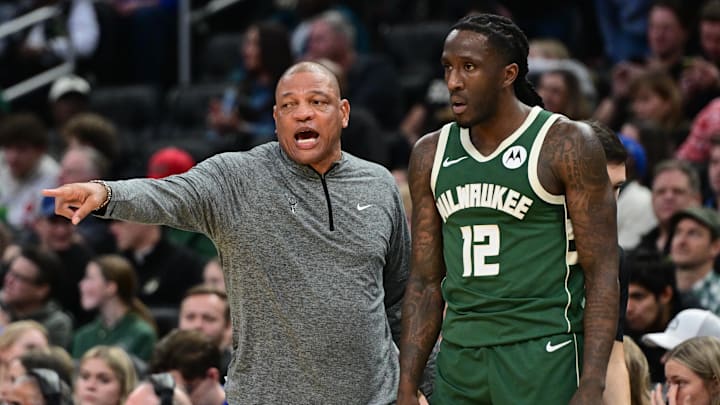 Dec 21, 2024; Milwaukee, Wisconsin, USA;  Milwaukee Bucks head coach Doc Rivers talks to guard Taurean Prince (12) in the second quarter against the Washington Wizards at Fiserv Forum. Mandatory Credit: Benny Sieu-Imagn Images