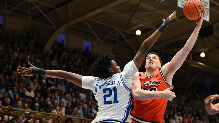Feb 28, 2026; Durham, North Carolina, USA; Virginia Cavaliers forward Thijs De Ridder (28) shoots over Duke Blue Devils center Patrick Ngongba II (21) during the first half at Cameron Indoor Stadium. Mandatory Credit: Rob Kinnan-Imagn Images Feb 28, 2026; Durham, North Carolina, USA; Virginia Cavaliers forward Thijs De Ridder (28) shoots over Duke Blue Devils center Patrick Ngongba II (21) during the first half at Cameron Indoor Stadium. Mandatory Credit: Rob Kinnan-Imagn Images