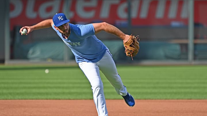 Sep 18, 2024; Kansas City, Missouri, USA; Kansas City Royals third baseman Paul DeJong (15) takes fielding practice before a game against the Detroit Tigers at Kauffman Stadium. Mandatory Credit: Peter Aiken-Imagn Images Sep 18, 2024; Kansas City, Missouri, USA; Kansas City Royals third baseman Paul DeJong (15) takes fielding practice before a game against the Detroit Tigers at Kauffman Stadium. Mandatory Credit: Peter Aiken-Imagn Images