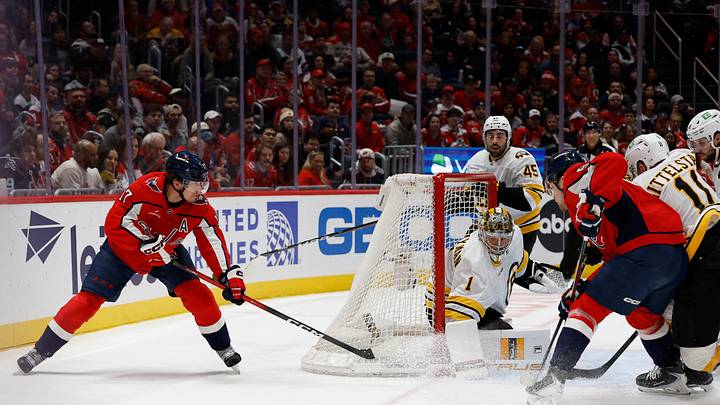 Mar 9, 2026; Washington, District of Columbia, USA; Washington Capitals center Dylan Strome (17) shoots the puck on Boston Bruins goaltender Jeremy Swayman (1) during the third period at Capital One Arena. Mandatory Credit: Geoff Burke-Imagn Images