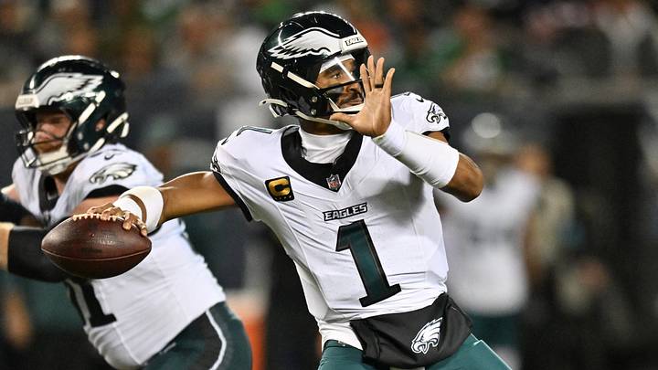 Sep 28, 2026; Chicago, Illinois, USA;  Philadelphia Eagles quarterback Jalen Hurts (1) passes against the Chicago Bears during the first half at Soldier Field.  