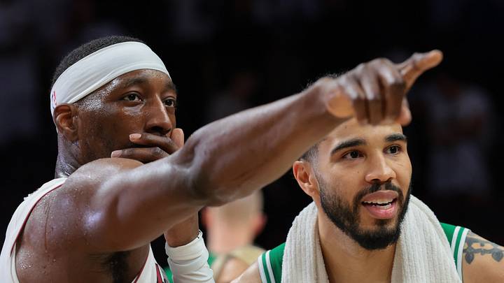 Apr 1, 2026; Miami, Florida, USA; Miami Heat center Bam Adebayo (13) signals while speaking to Boston Celtics forward Jayson Tatum (0) after the game at Kaseya Center. Mandatory Credit: Sam Navarro-Imagn Images