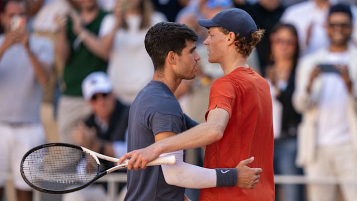 Carlos Alcaraz of Spain and Jannik Sinner of Italy after their match on day 13 of Roland Garros at Stade Roland Garros. Mandatory Credit: Susan Mullane-Imagn Images