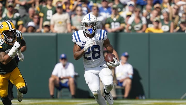 Sep 15, 2024; Green Bay, Wisconsin, USA;  Indianapolis Colts running back Jonathan Taylor (28) during the game against the Green Bay Packers at Lambeau Field. Mandatory Credit: Jeff Hanisch-Imagn Images