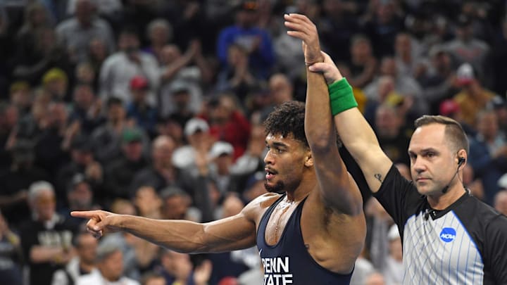 Penn State wrestler Carter Starocci celebrates winning his fifth straight NCAA wrestling title at the 2025 NCAA Wrestling Championships in Philadelphia. 
