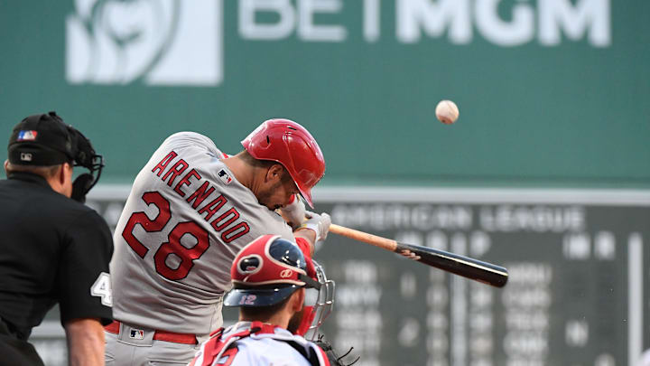 May 12, 2023; Boston, Massachusetts, USA; St. Louis Cardinals third baseman Nolan Arenado (28) hits a two run home run against the Boston Red Sox during the first inning at Fenway Park. Mandatory Credit: Eric Canha-Imagn Images May 12, 2023; Boston, Massachusetts, USA; St. Louis Cardinals third baseman Nolan Arenado (28) hits a two run home run against the Boston Red Sox during the first inning at Fenway Park. Mandatory Credit: Eric Canha-Imagn Images