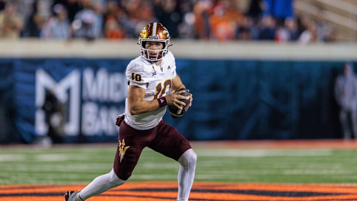 Nov 2, 2024; Stillwater, Oklahoma, USA; Arizona State Sun Devils quarterback Sam Leavitt (10) scrambles in the back field during the fourth quarter against the Oklahoma State Cowboys at Boone Pickens Stadium. Mandatory Credit: William Purnell-Imagn Images