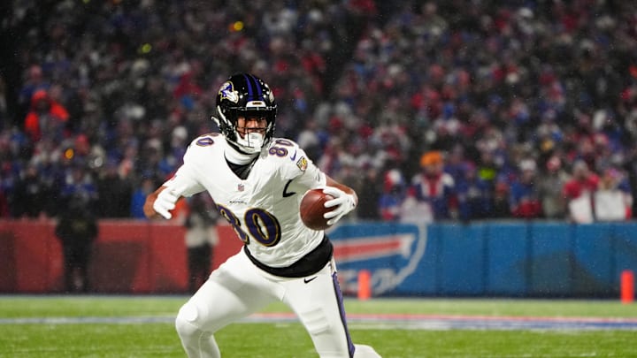 Baltimore Ravens tight end Isaiah Likely runs the ball after making a catch during the first quarter against the Buffalo Bills. Mandatory Credit: Gregory Fisher-Imagn Images