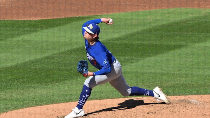 Feb 25, 2026; Salt River Pima-Maricopa, Arizona, USA; Los Angeles Dodgers pitcher River Ryan (77) throws in the third inning against the Arizona Diamondbacks at Salt River Fields at Talking Stick. Mandatory Credit: Matt Kartozian-Imagn Images Feb 25, 2026; Salt River Pima-Maricopa, Arizona, USA; Los Angeles Dodgers pitcher River Ryan (77) throws in the third inning against the Arizona Diamondbacks at Salt River Fields at Talking Stick. Mandatory Credit: Matt Kartozian-Imagn Images