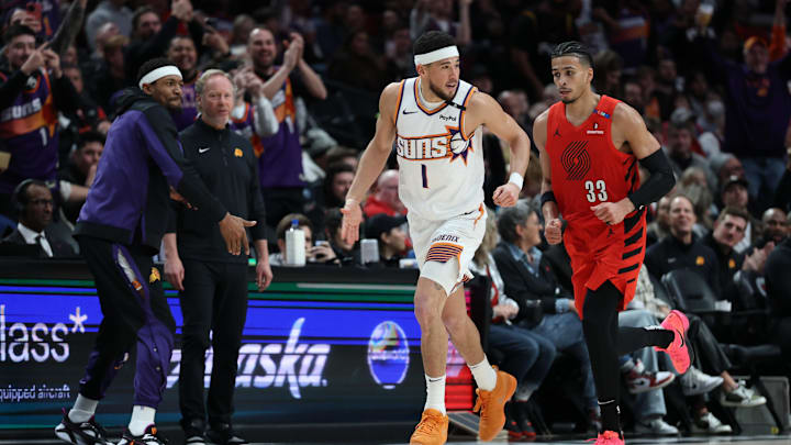 Feb 3, 2025; Portland, Oregon, USA; Phoenix Suns guard Devin Booker (1) reacts after scoring against the Portland Trail Blazers to make Booker the Suns’ all-time leading scorer in the second half at Moda Center. Mandatory Credit: Jaime Valdez-Imagn Images Feb 3, 2025; Portland, Oregon, USA; Phoenix Suns guard Devin Booker (1) reacts after scoring against the Portland Trail Blazers to make Booker the Suns’ all-time leading scorer in the second half at Moda Center. Mandatory Credit: Jaime Valdez-Imagn Images
