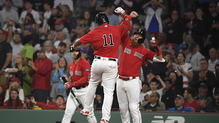 Jun 13, 2023; Boston, Massachusetts, USA; Boston Red Sox third baseman Rafael Devers (11) reacts