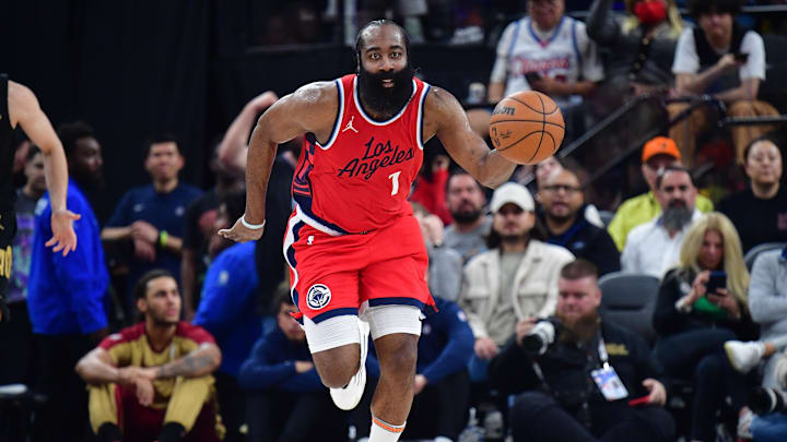 Mar 18, 2025; Inglewood, California, USA; Los Angeles Clippers guard James Harden (1) moves the ball down court against the Cleveland Cavaliers during the second half at Intuit Dome. Mandatory Credit: Gary A. Vasquez-Imagn Images