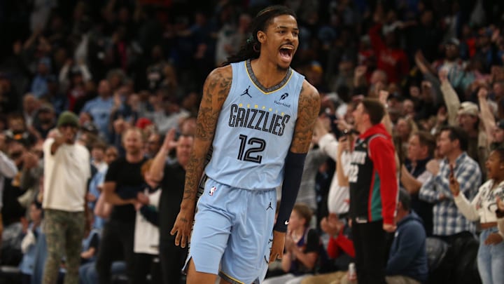Feb 25, 2025; Memphis, Tennessee, USA; Memphis Grizzlies guard Ja Morant (12) reacts during over-time against the Phoenix Suns at FedExForum. Mandatory Credit: Petre Thomas-Imagn Images