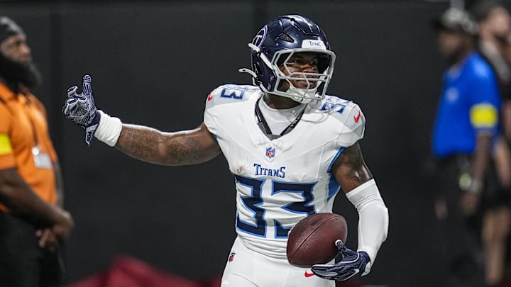 Aug 15, 2025; Atlanta, Georgia, USA; Tennessee Titans safety Kendell Brooks (33) reacts after running for a touchdown after intercepting a pass against the Atlanta Falcons during the first half at Mercedes-Benz Stadium. Mandatory Credit: Dale Zanine-Imagn Images Aug 15, 2025; Atlanta, Georgia, USA; Tennessee Titans safety Kendell Brooks (33) reacts after running for a touchdown after intercepting a pass against the Atlanta Falcons during the first half at Mercedes-Benz Stadium. Mandatory Credit: Dale Zanine-Imagn Images