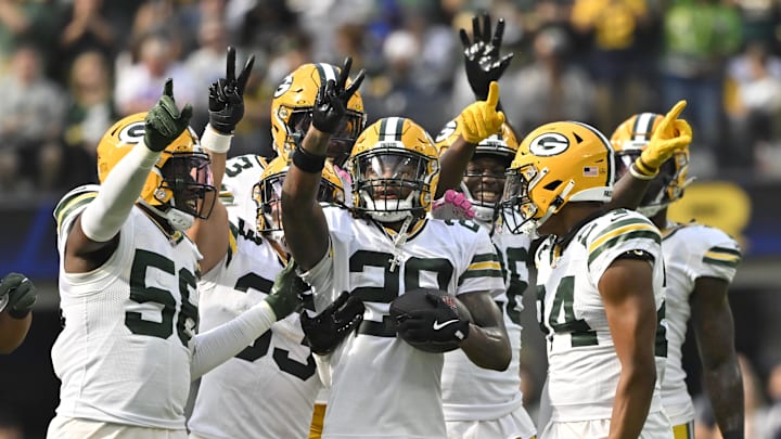 The Green Bay Packers defense celebrates after safety Xavier McKinney intercepted Rams QB Matthew Stafford on Sunday. The Green Bay Packers defense celebrates after safety Xavier McKinney intercepted Rams QB Matthew Stafford on Sunday.