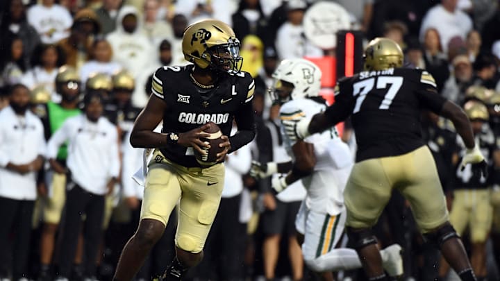 Sep 21, 2024; Boulder, Colorado, USA; Colorado Buffaloes quarterback Shedeur Sanders (2) rolls out of the pocket on a play during the first half against the Baylor Bears at Folsom Field. Mandatory Credit: Christopher Hanewinckel-Imagn Images