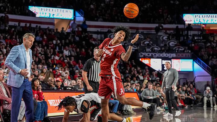Mar 3, 2026; Athens, Georgia, USA; Alabama Crimson Tide guard Aden Holloway (2) goes after a loose ball over Georgia Bulldogs guard Jeremiah Wilkinson (5) at Stegeman Coliseum. Mandatory Credit: Dale Zanine-Imagn Images Mar 3, 2026; Athens, Georgia, USA; Alabama Crimson Tide guard Aden Holloway (2) goes after a loose ball over Georgia Bulldogs guard Jeremiah Wilkinson (5) at Stegeman Coliseum. Mandatory Credit: Dale Zanine-Imagn Images