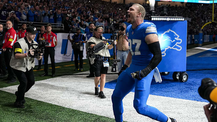 Detroit Lions defensive end Aidan Hutchinson (97) cheers on at players introduction before first half against Minnesota Vikings at Ford Field in Detroit on Sunday, November 2, 2025. Detroit Lions defensive end Aidan Hutchinson (97) cheers on at players introduction before first half against Minnesota Vikings at Ford Field in Detroit on Sunday, November 2, 2025.