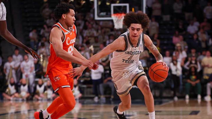 Mar 4, 2025; Atlanta, Georgia, USA; Georgia Tech Yellow Jackets guard Naithan George (1) drives to the basket against the Miami Hurricanes in the second half at McCamish Pavilion. Mandatory Credit: Brett Davis-Imagn Images