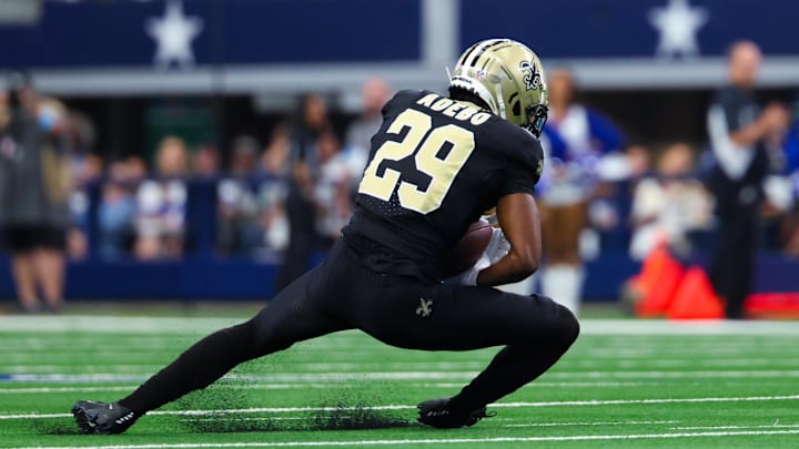 Sep 15, 2024; Arlington, Texas, USA; New Orleans Saints cornerback Paulson Adebo (29) intercepts a ball intended for Dallas Cowboys wide receiver Jalen Brooks (not pictured) during the first half at AT&T Stadium. Sep 15, 2024; Arlington, Texas, USA; New Orleans Saints cornerback Paulson Adebo (29) intercepts a ball intended for Dallas Cowboys wide receiver Jalen Brooks (not pictured) during the first half at AT&T Stadium.
