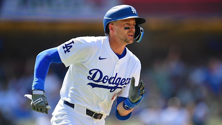 Jul 25, 2024; Los Angeles, California, USA; Los Angeles Dodgers shortstop Nick Ahmed (12) runs after hitting a solo home run against the San Francisco Giants during the eighth inning at Dodger Stadium. Mandatory Credit: Gary A. Vasquez-Imagn Images Jul 25, 2024; Los Angeles, California, USA; Los Angeles Dodgers shortstop Nick Ahmed (12) runs after hitting a solo home run against the San Francisco Giants during the eighth inning at Dodger Stadium. Mandatory Credit: Gary A. Vasquez-Imagn Images